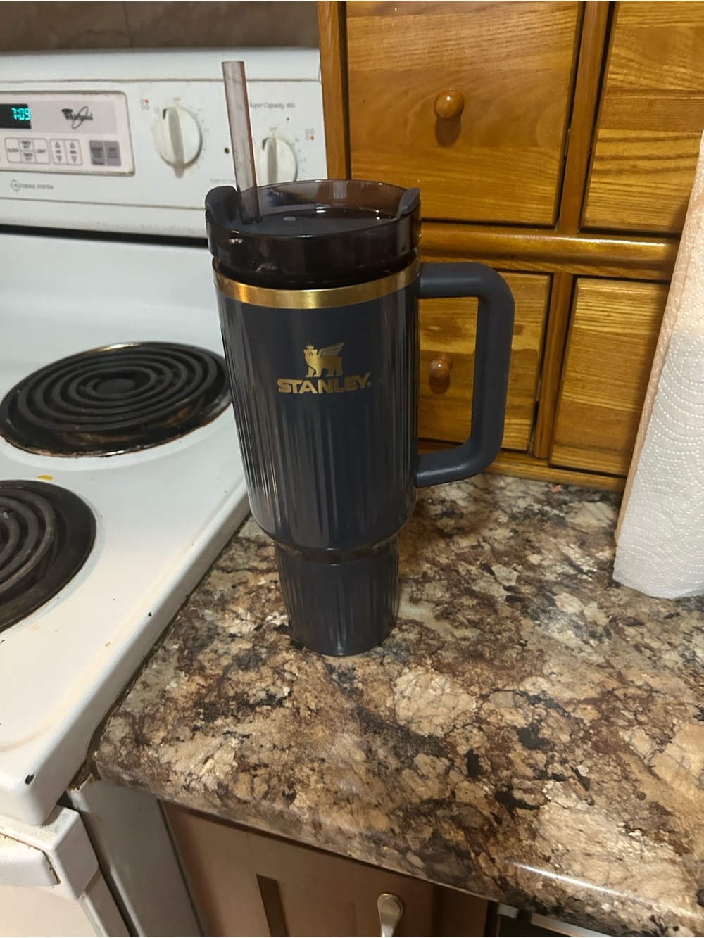 Stanley Navy Blue Travel Tumbler with Handle and Gold Accent
